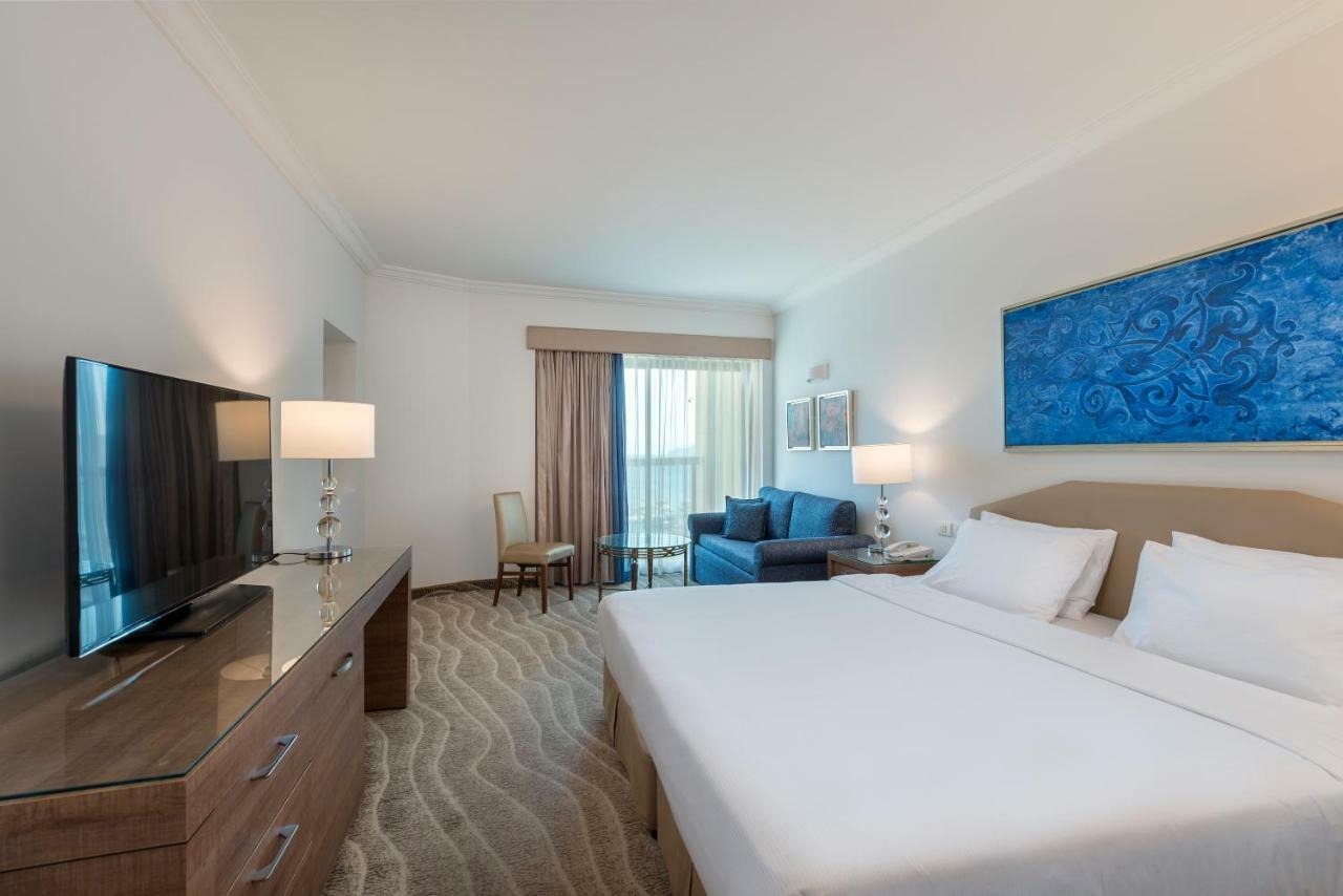 Chambre de Luxe avec Balconnet (2 Adultes + 1 Enfant)